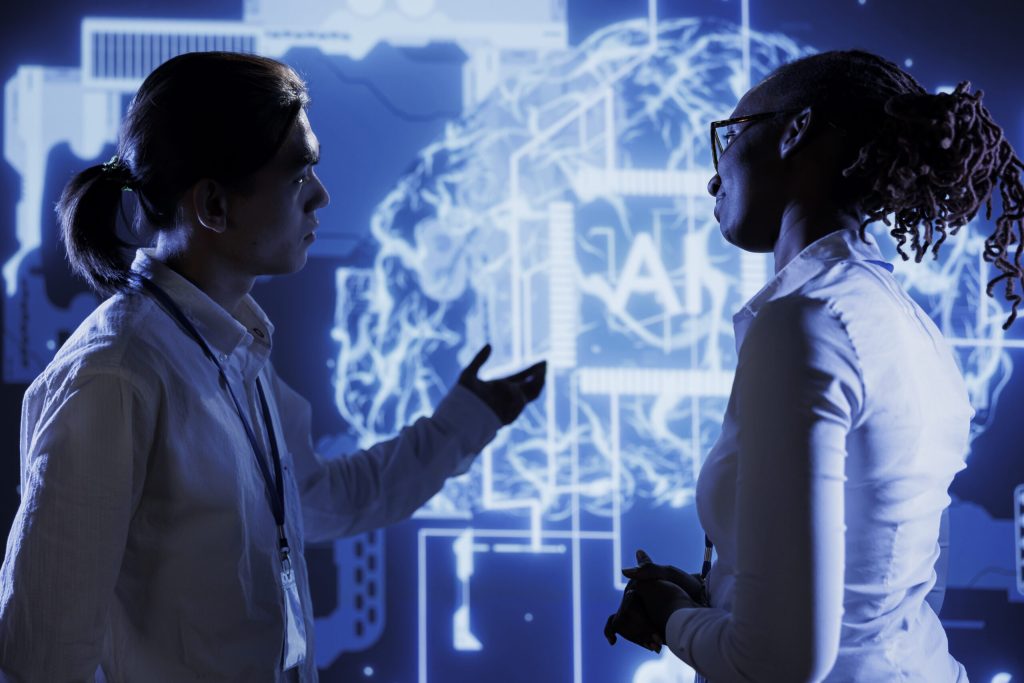 Coworkers brainstorming ways to use AI